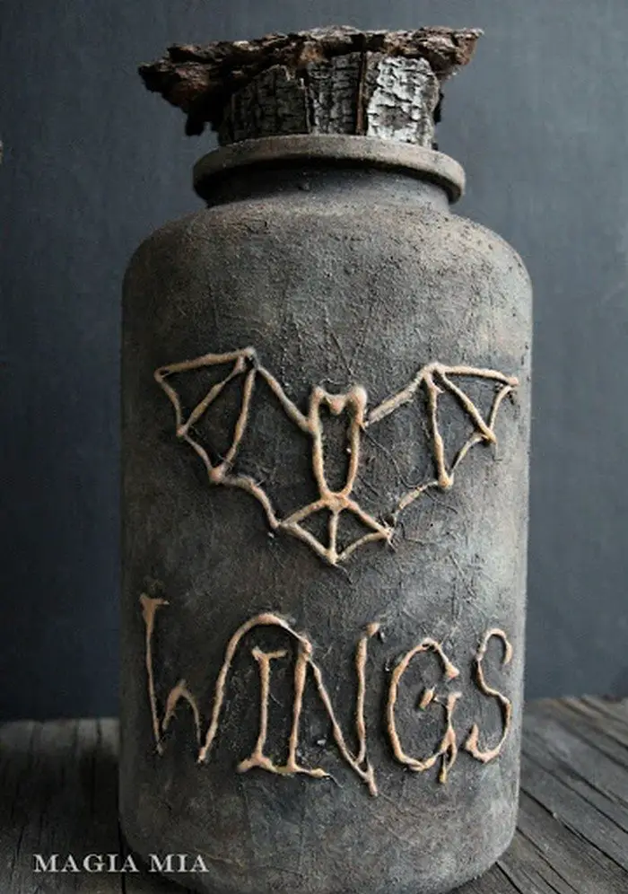 Witch’s potion bottles from tin cans and plastic medicine