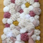 grey pompom rugs