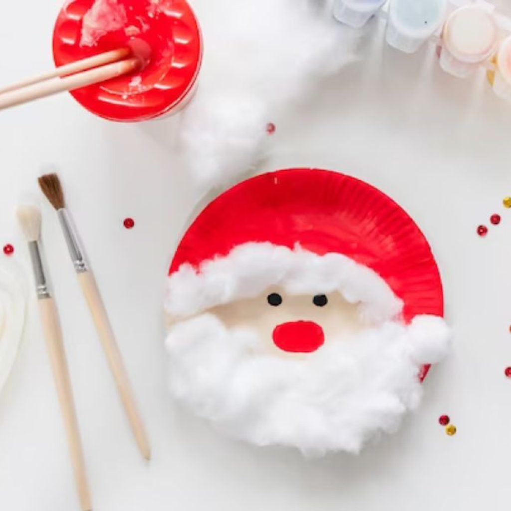 An image of a paper plate Christmas craft santa. 