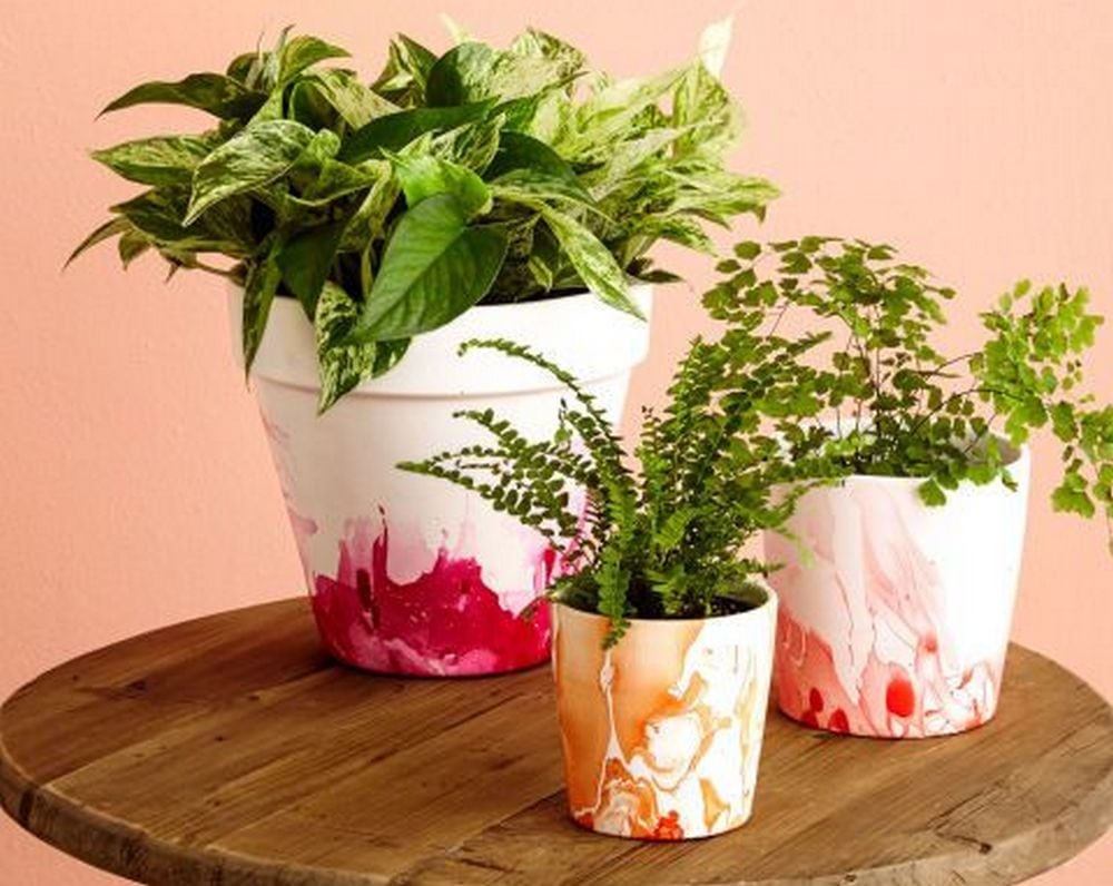 nail polish marbled flower pots.