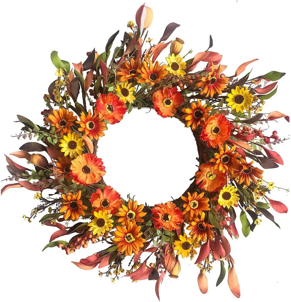 Hanging a wreath on your door or somewhere nearby to greet the season is one of the first fall decor ideas we suggest.