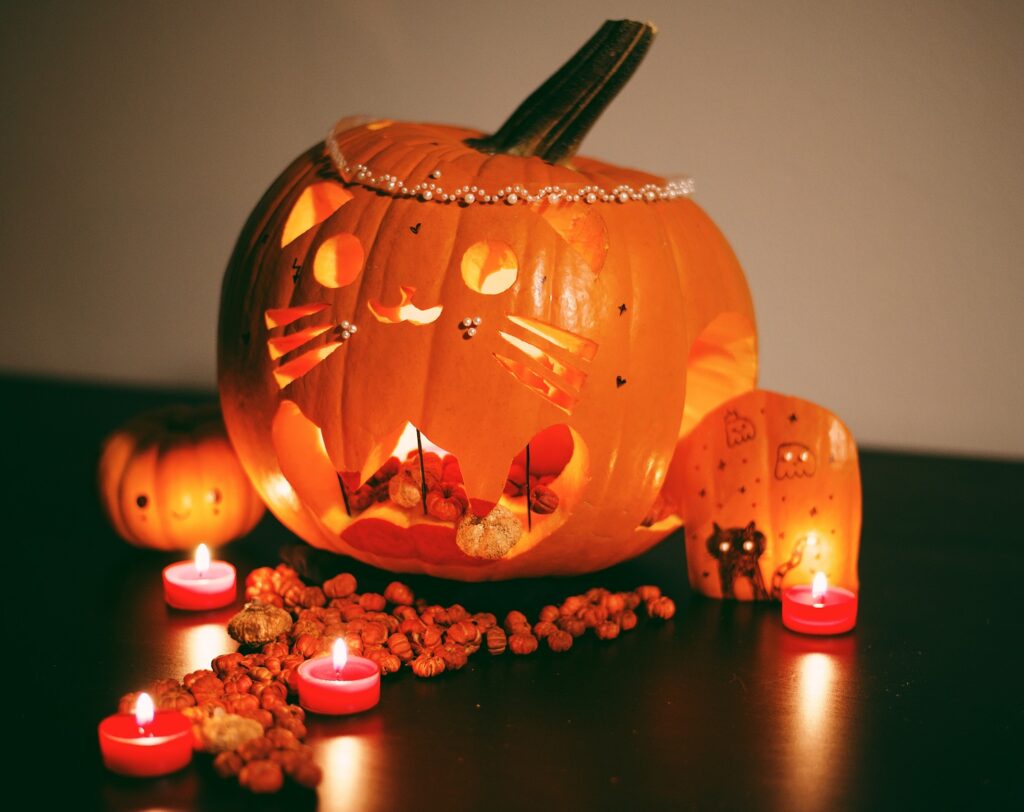 Pumpkin votives placed in an area to add more fall vibes.