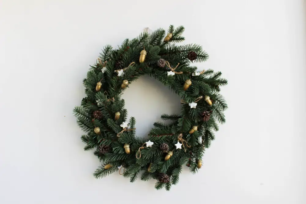 An image of a Christmas wreath with various decorations.