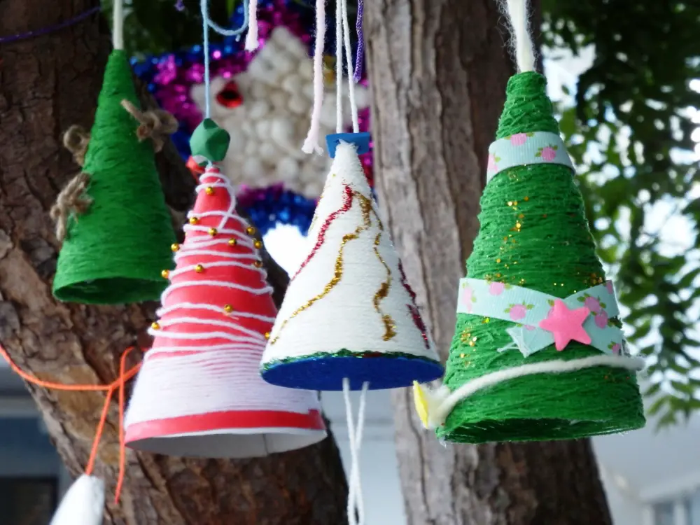 An image of several fabric Christmas trees.
