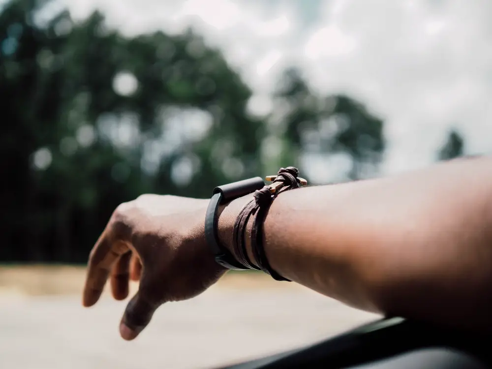 An image of a person wearing a recycled bracelet.