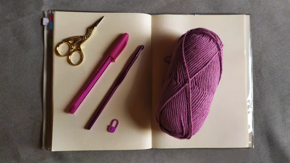 An image of the different materials and tools for crochet.