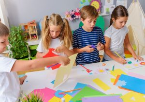 An image of children doing crafts for kids.