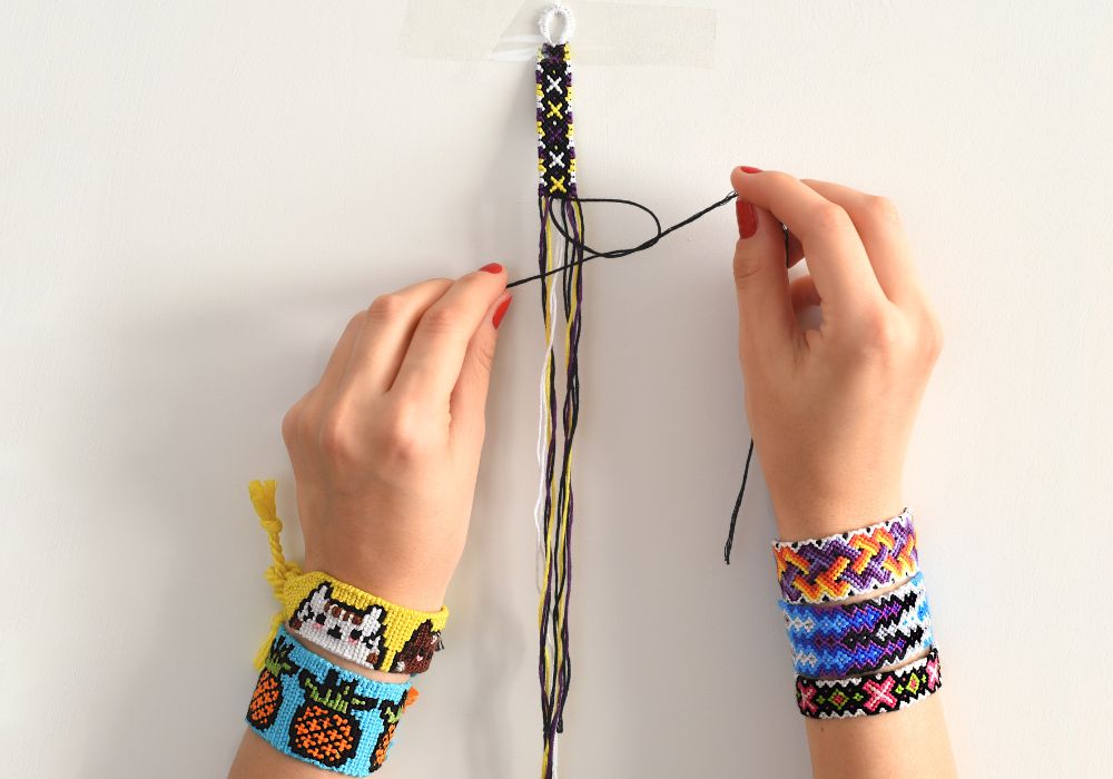 Friendship bracelets crafting.