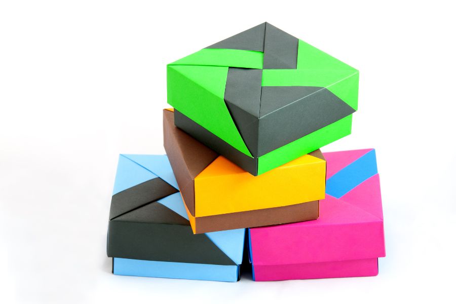 An image of four stacked origami boxes.