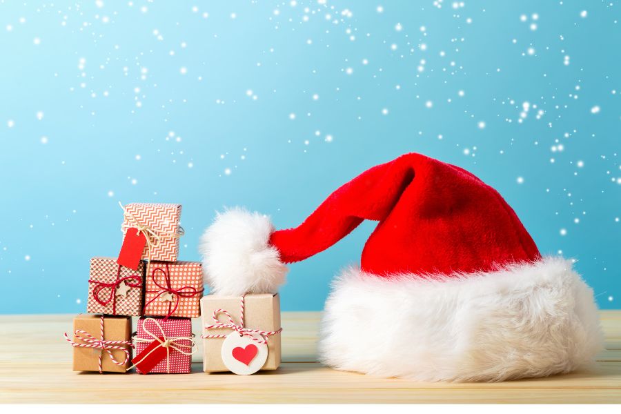 An image of a Santa hat with decoration presents. 